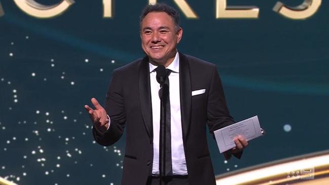 Sam Pang accepts the Logie for Most Popular Actress on behalf of Kitty Flanagan. Picture: Channel 9