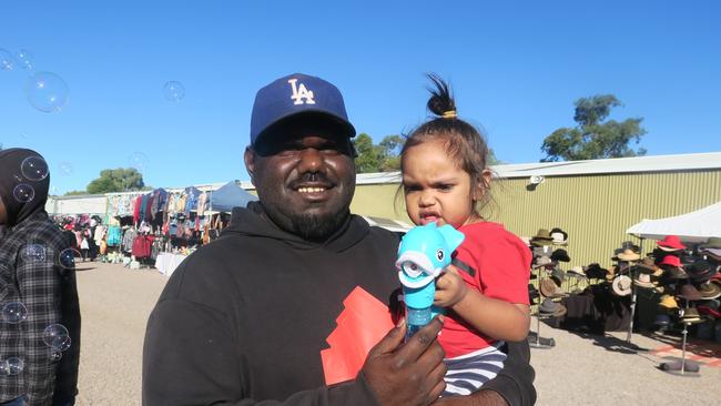 Hayden Reiff and Jetta Reiff blow bubbles at the 2023 Alice Springs Show. Photo: Laura Hooper.