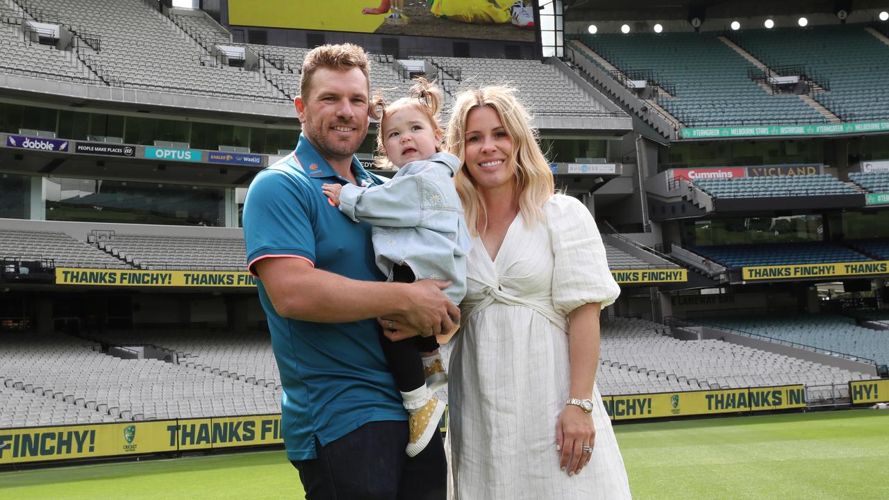 Aaron Finch, with his daughter Esther 17 months and wife Amy at the MCG. Picture: NCA NewsWire / David Crosling