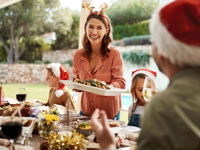 Cropped shot of a happy family having Christmas lunch together. Picture: iStock.