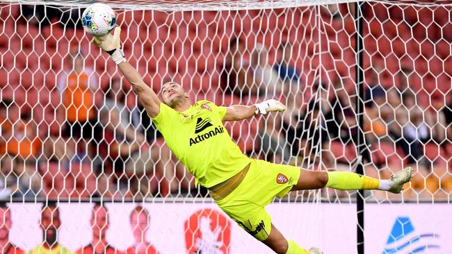 Roar goalkeeper Max Crocombe makes a flying save. Picture: Getty Images