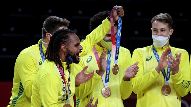 Patty Mills of Team Australia celebrates with his bronze medal