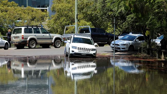 Northey Street Windsor, during local flooding from Enoggera Creek, Brisbane, about 10am today. (AAP Image/Jono Searle)