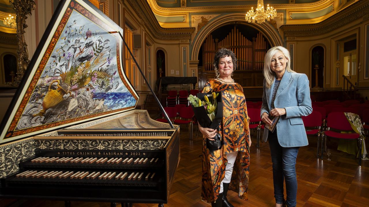 Artist Deborah Wace and Arts Minister Elise Archer beside the new harpsichord purchased through donated funds for Van Diemen's Band. (Supplied: Richard Jupe)