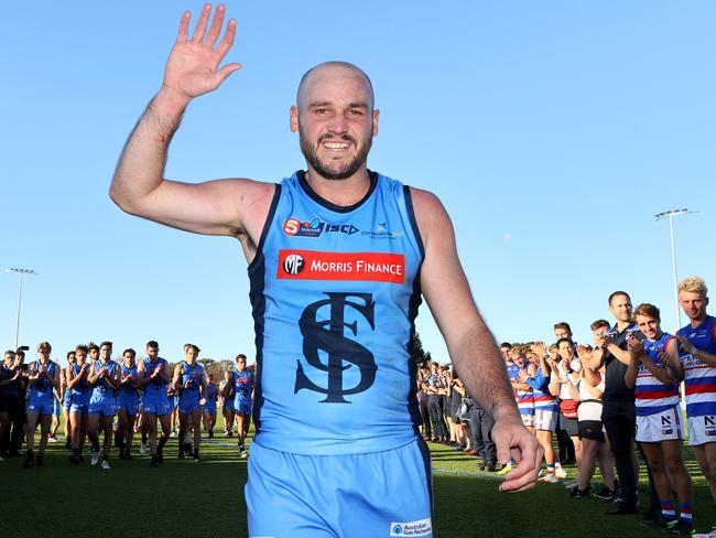 22/05/2021: Dual Magarey Medallist & premiership captain Zane Kirkwood walks from the ground after announcing todays SANFL game will be his last due to persistent back issues Picture: Kelly Barnes