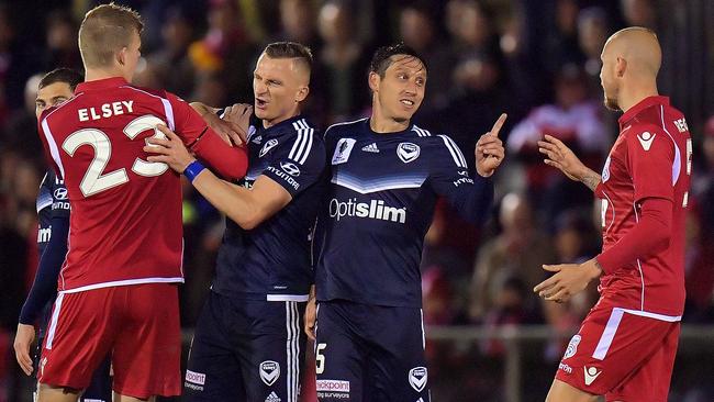 Reds and Victory players clash during the round of 16 FFA Cup match between at Marden Sports Complex last year. Picture: Daniel Kalisz/Getty Images