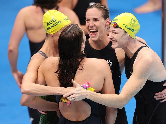 TOKYO, JAPAN - JULY 25: Emma McKeon, Bronte Campbell, Meg Harris and Cate Campbell of Team Australia celebrate after winning the gold medal in the Women's 4 x 100m Freestyle Relay Final on day two of the Tokyo 2020 Olympic Games at Tokyo Aquatics Centre on July 25, 2021 in Tokyo, Japan. (Photo by David Ramos/Getty Images)