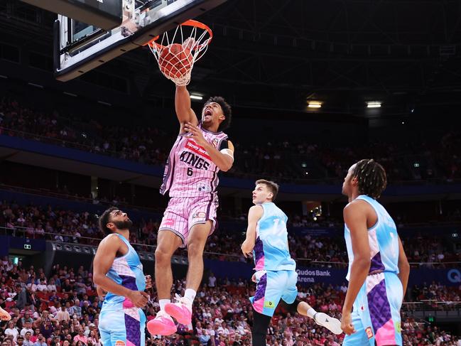 SYDNEY, AUSTRALIA - JANUARY 14:  Jaylin Galloway of the Kings slam dunks during the round 15 NBL match between Sydney Kings and New Zealand Breakers at Qudos Bank Arena, on January 14, 2024, in Sydney, Australia. (Photo by Matt King/Getty Images)