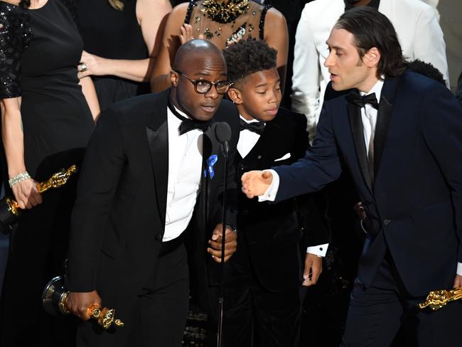 Director Barry Jenkins and the cast and crew of 'Moonlight' accept the Best Picture award onstage during the 89th Annual Academy Awards. Picture: Getty