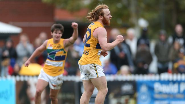 Angus Poole, right, celebrates after he kicked a goal during the final quarter. Picture: Stephen Laffer