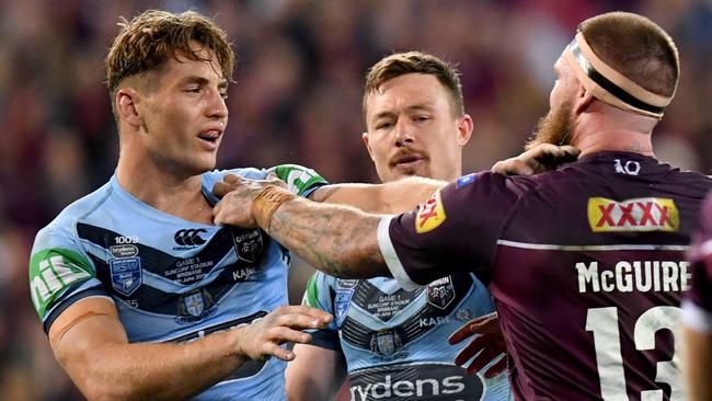 Cameron Murray (left) and Damien Cook (centre) remain a serious threat to Queensland’s chances of sealing the series in Perth. Picture: AAP Image/Darren England