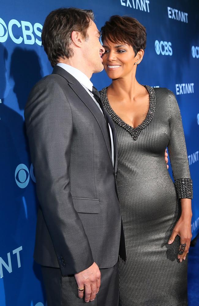 Look of love ... Olivier Martinez and Halle Berry attend the premiere of her new TV series Extant at the  California Science Centre.