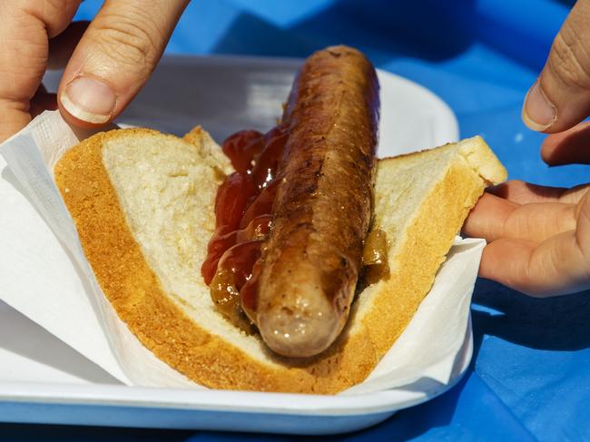 SYDNEY, AUSTRALIA - NewsWire Photos OCTOBER 11, 2020: A sausage sandwich is seen at Bunnings Alexandria where itÃs sausage sizzle has resumed after COVID-19 restrictions. Picture: NCA NewsWire / Jenny Evans