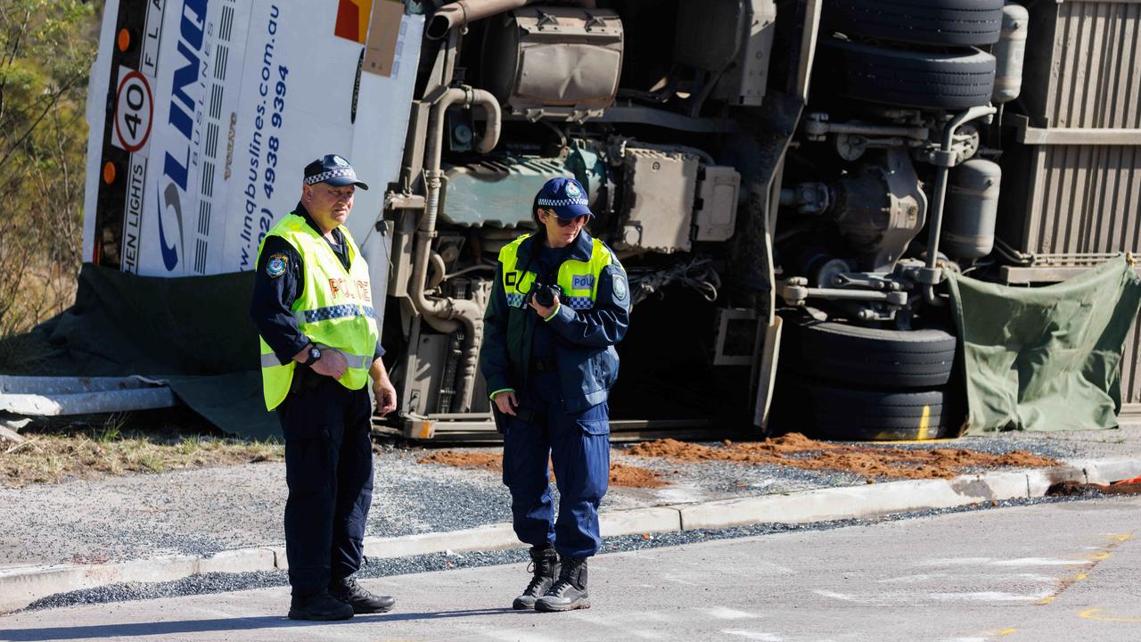 Police at the scene of the crash. Picture: David Swift