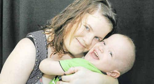 Alysha Wise with her now healthy son Tyler Kaplan who was born three months early. . Picture: Max Fleet