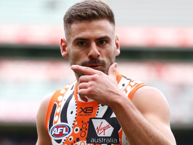 MELBOURNE, AUSTRALIA - MAY 26: Stephen Coniglio of the Giants celebrates a goal during the 2019 AFL round 10 match between the Melbourne Demons and the GWS Giants at the Melbourne Cricket Ground on May 26, 2019 in Melbourne, Australia. (Photo by Michael Willson/AFL Photos)