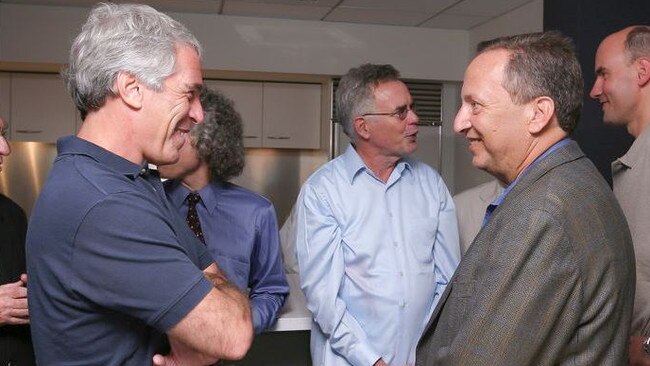 Jeffrey Epstein at a Harvard event with former university President Lawrence Summers, right, who had more than a dozen meetings scheduled with Epstein from 2013 to 2016. PHOTO: RICK FRIEDMAN/POLARIS