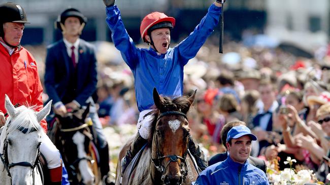 Kerrin McEvoy celebrates his 2018 Melbourne Cup on Cross Counter. Picture: AAP Image