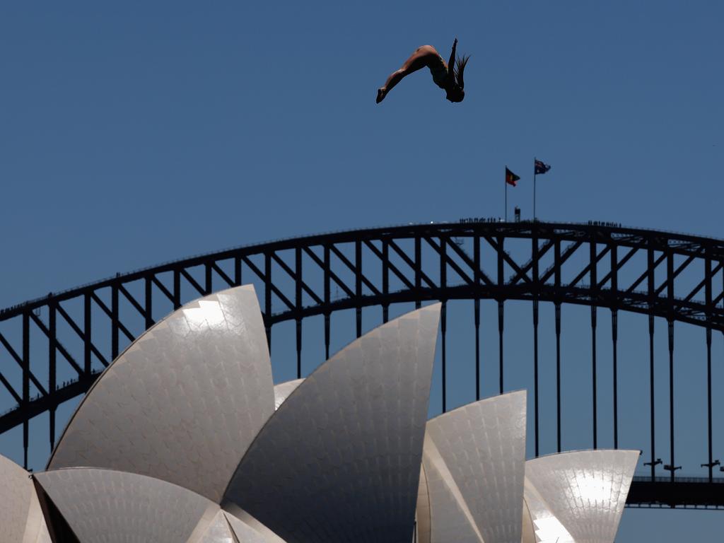 The USA’s Kaylea Arnett soared through the air in a breathtaking dive during the Red Bull Cliff Diving World Final at Mrs Macquarie’s Chair on Sydney Harbour. The crowd gasped as Arnett executed her daring plunge, showcasing incredible precision and courage in one of the world’s most exciting cliff diving events. Picture: Getty