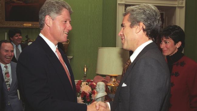 Ghislaine Maxwell watches as Jeffrey Epstein and US President Bill Clinton shake hands.Picture: WILLIAM J. CLINTON PRESIDENTIAL LIBRARY--