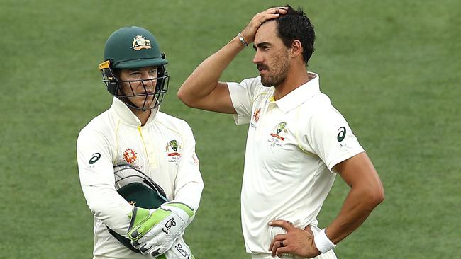 Tim Paine speaks with Mitchell Starc in Adelaide. Picture: Getty