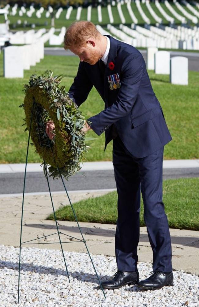 Prince Harry and Meghan have marked #RemembranceSunday by visiting the Los Angeles National Cemetery today. Picture: Lee Morgan/ Twitter