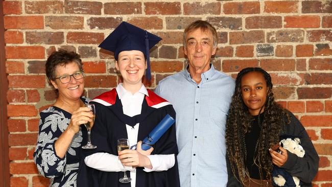 Helen Dietrich and graduating daughter, Kia and her dad Graham and sister Jayden at the Deakin University Graduation post ceremony celebration. Picture: Alison Wynd