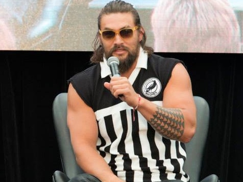 Jason Momoa in a Port Adelaide guernsey at the 2014 Oz Comic-Con in Sydney . Picture:  Javis Wong/Oz Comic-con