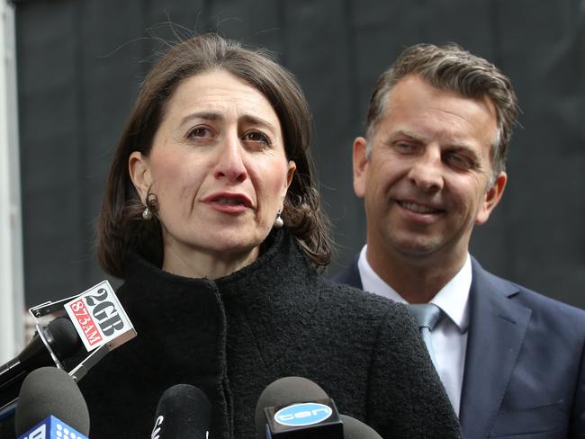 Premier Gladys Berejiklian and Minister for Transport and Infrastructure Andrew Constance said the new stations will improve rail safety. Picture: Richard Dobson