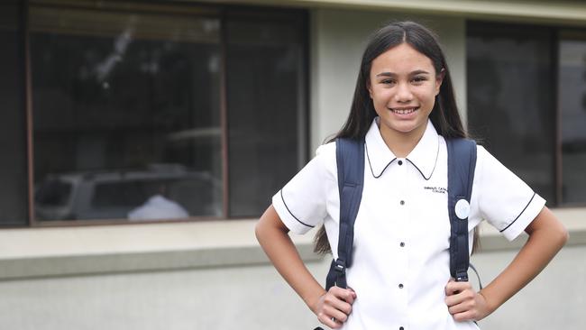 Talita Soatini, 12, from Werrington, on her first day of high school at Emmaus Catholic College, Kemps Creek. Picture: Dylan Robinson