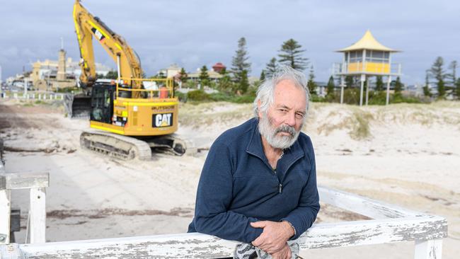 Port Adelaide Residents Environment Protection Group secretary Tony Bazeley showing coastal erosion of the dunes at Semaphore. Picture: Brenton Edwards