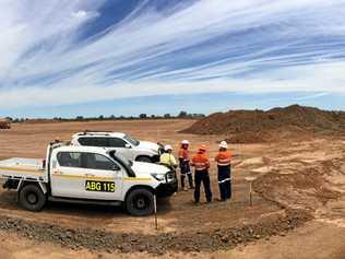 Adani and contractor personnel overseeing the earthworks of the temporary camp hardstand including sediment basin excavation. Picture: Contributed