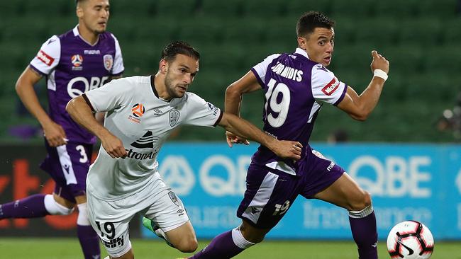 Jack Hingert tries to get the better of the impressive Chris Ikonomidis. Picture: Getty.