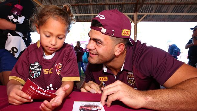 Five-year-old Amy Cassel doesn’t seem convinced by David Fifita. Image: Adam Head