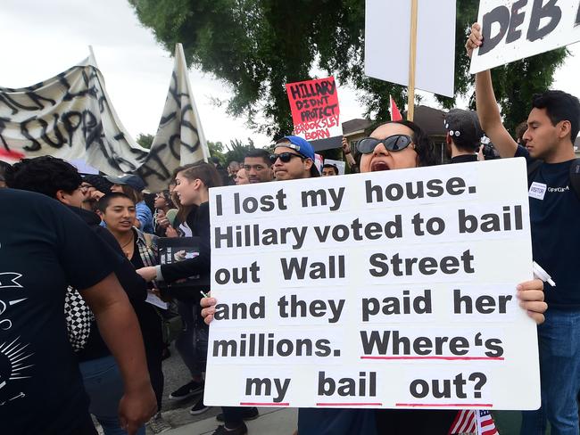Protesters from Latino and Community groups make their way to East Los Angeles College in Monterey Park, California. Picture: AFP