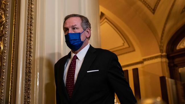 One of Donald Trump’s defence lawyers Michael T. van der Veen walks through the Senate Reception Room during the second day the trial. Picture: AFP.