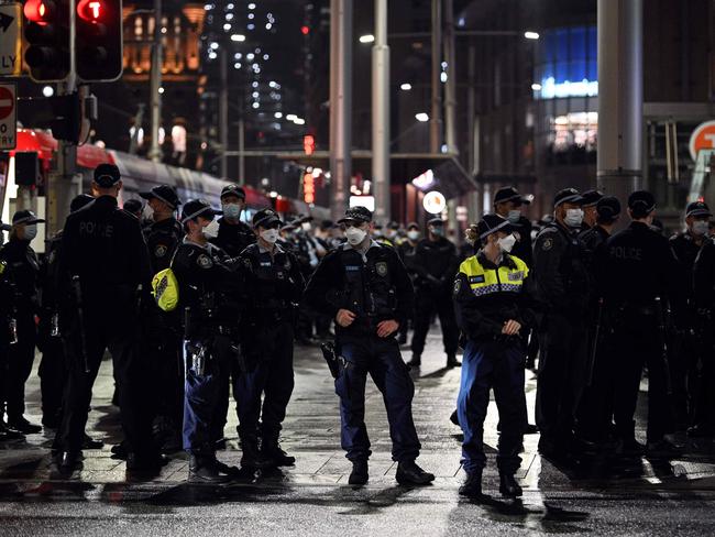 Police corden off the area around Town Hall last night. Picture: AFP