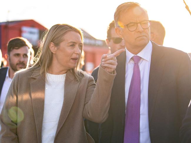 Leader of the opposition Anthony Albanese and his partner Jodie Haydon arrive at a pre-polling site in Launceston, Tasmania on May 20, 2022. Picture: Wendell Teodoro / AFP.