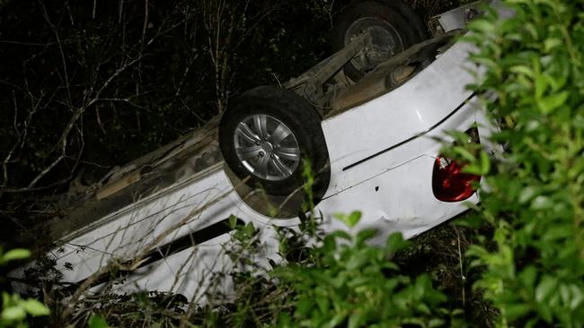 The Nissan Pulsar flipped on its roof, after Cooper lost control during a police pursuit. Picture: Bill Hearne