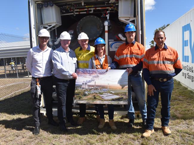 Energy minister Mick de Brenni with Keppel MP Brittany Lauga, Rockhampton MP Barry O'Rourke with Stanwell employees at the iron flow battery storage at Stanwell Power Station.