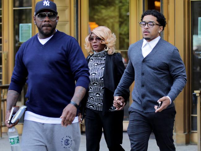 Diddy’s mum Janice Combs (C), and son Justin Combs (R) depart federal court in Manhattan during a break in the sex trafficking trial in New York City. Picture: AFP