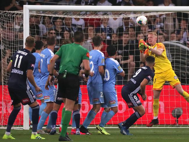 Ola Toivonen of Melbourne Victory scores as goal after Melbourne City goalkeeper Tom Glover is unable to make the save during the Round 18 A-League match between the Melbourne City FC and the Melbourne Victory at AAMI Park in Melbourne, Friday, February 7, 2020. (AAP Image/George Salpigtidis) NO ARCHIVING