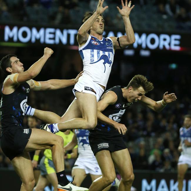 Flying Kangaroo: Garner soars before pulling in a beauty. Picture: George Salpigtidis