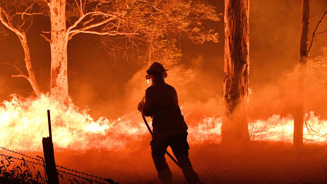 Scott Morrison has acknowledged climate change is linked to the unusually long bushfire season. Picture: Saeed Khan/AFP
