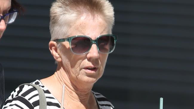 Jan Dubois, wife of Garry Dubois, arrives at court.