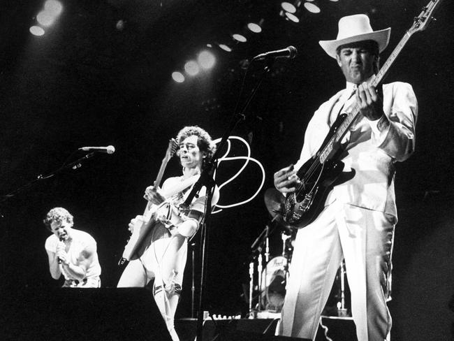 26/04/1983. Shirley Strachan, Bob 'Bongo' Starkie and Greg MacAinsh  performing during the recent Skyhooks concert at Festival Hall. Melbourne. Music group. Band. Neg: 830426/116