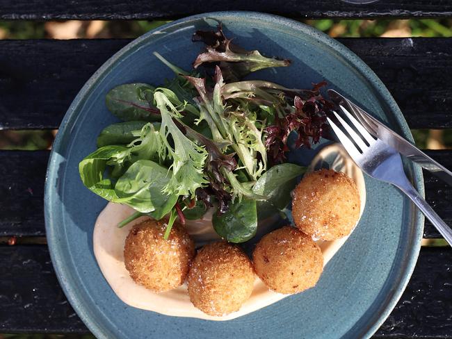 The leek and three cheese arancini balls. Picture: LUKE BOWDEN