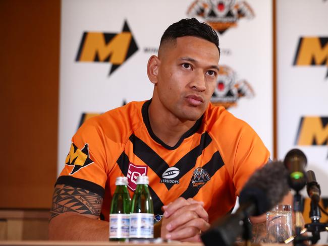 Israel Folau speaks to the media during a press conference to announce his return to rugby league on the Gold Coast. Picture: Chris Hyde/Getty Images