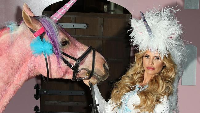 Katie Price with a horse because of course. Picture: Splash News