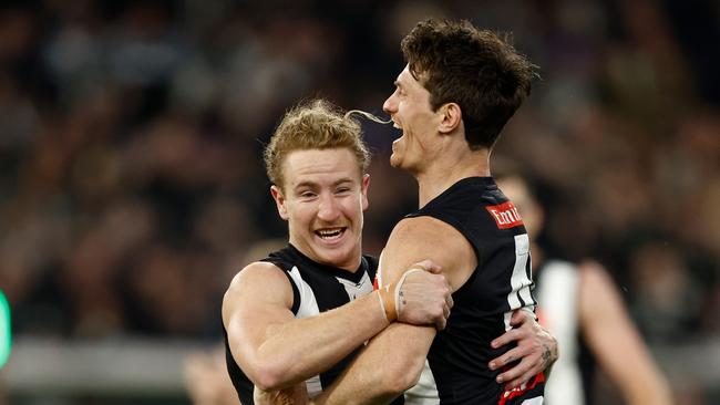 Brody Mihocek (right) and Beau McCreery of the Magpies celebrate as Collingwood qualified for the grand final. (Photo by Michael Willson/AFL Photos via Getty Images)